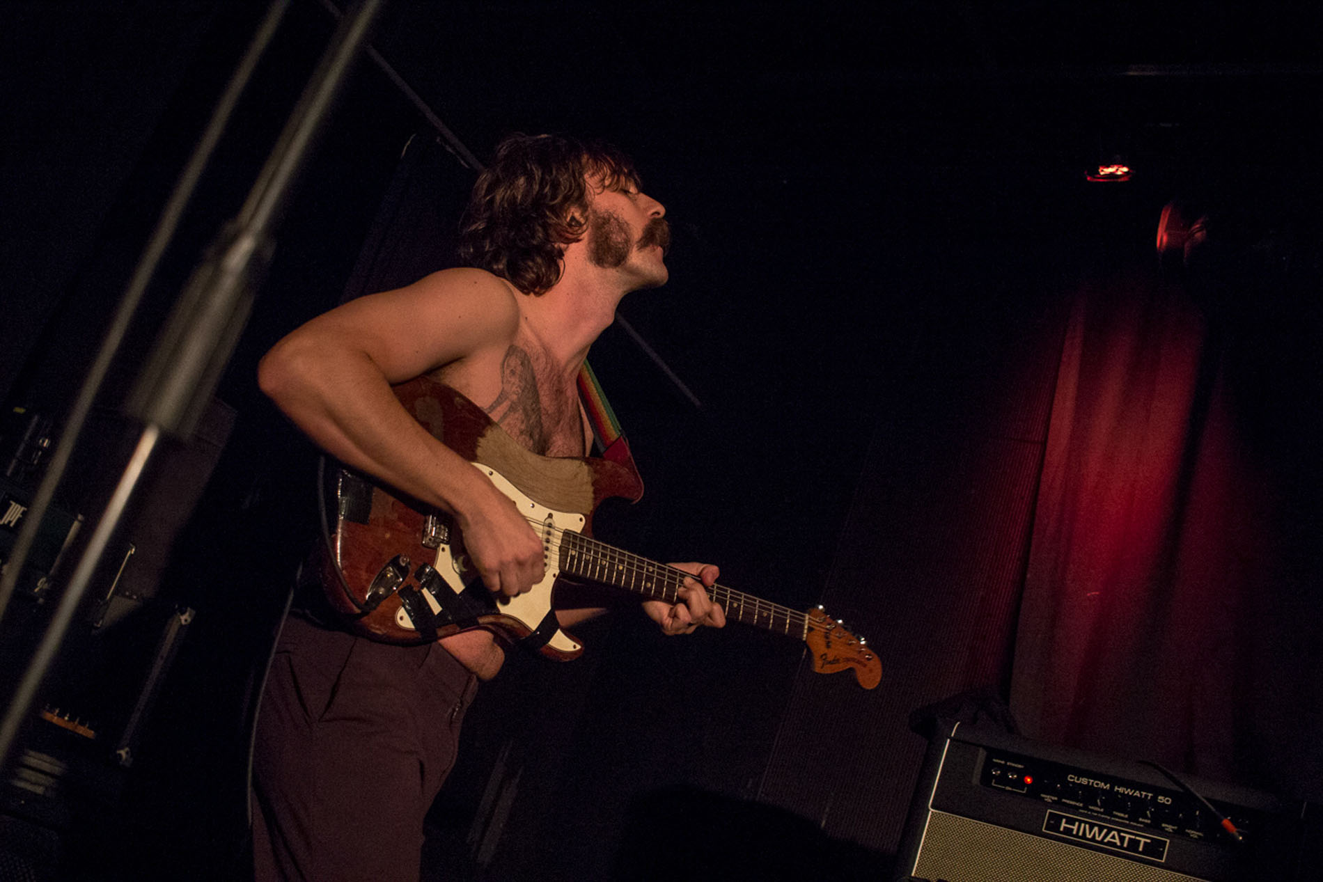 Guitarist performing with IDLES at Hard Club in Porto.